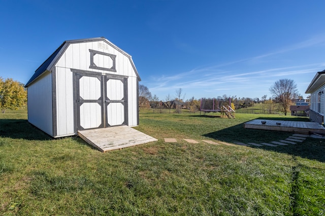 view of outdoor structure with a yard