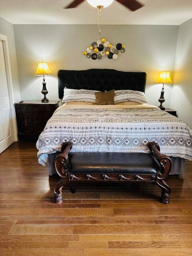 bedroom featuring ceiling fan and wood-type flooring