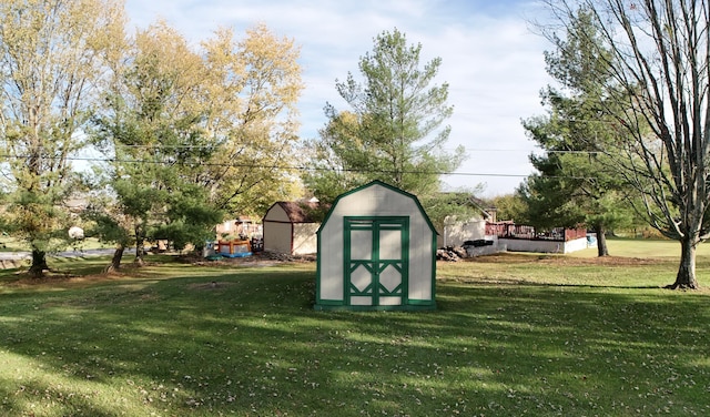 view of outbuilding with a lawn