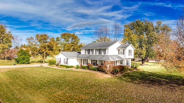 view of front of home with a front lawn