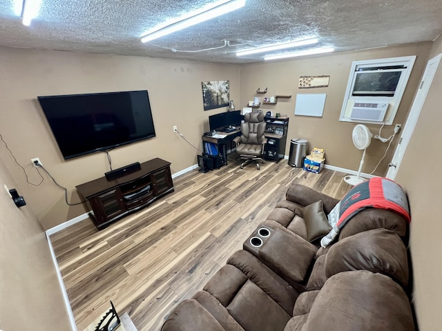 living room with wood-type flooring and cooling unit