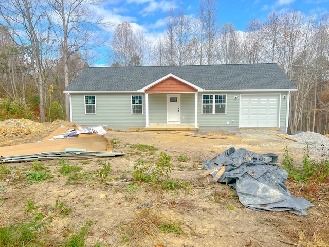 single story home with a garage