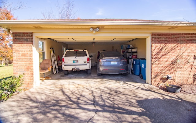 view of car parking with a garage and a carport