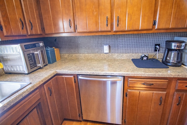 kitchen with decorative backsplash and dishwasher