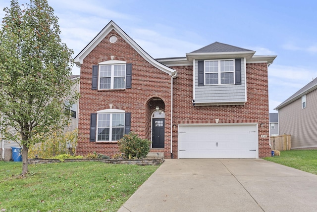 view of front of house with a front lawn and a garage