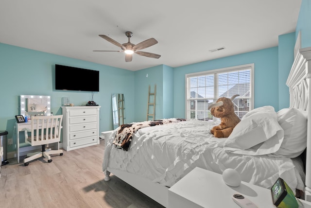 bedroom featuring light wood-type flooring and ceiling fan