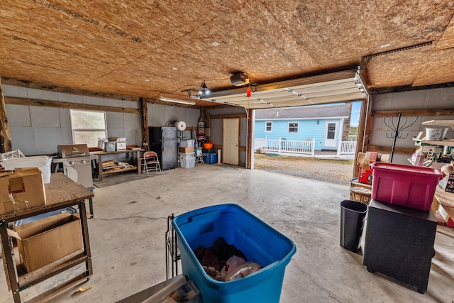 garage featuring black refrigerator