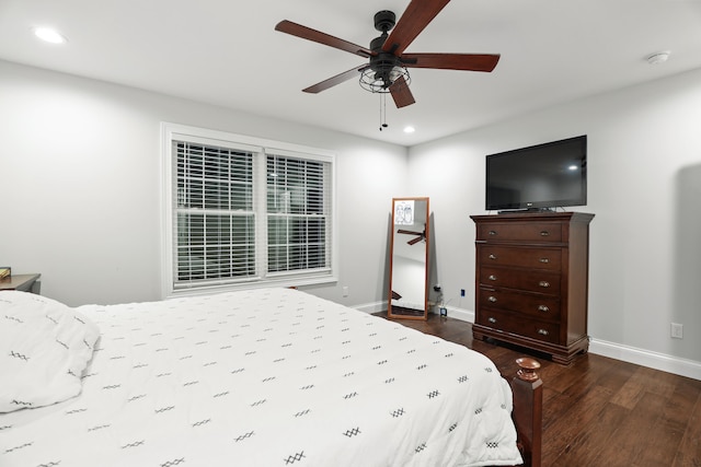 bedroom featuring hardwood / wood-style floors and ceiling fan