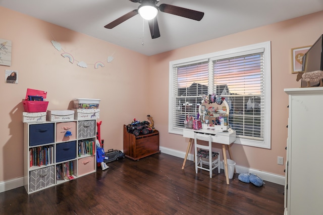 office space featuring dark hardwood / wood-style flooring and ceiling fan