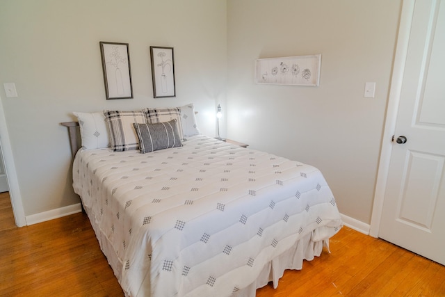 bedroom featuring wood-type flooring