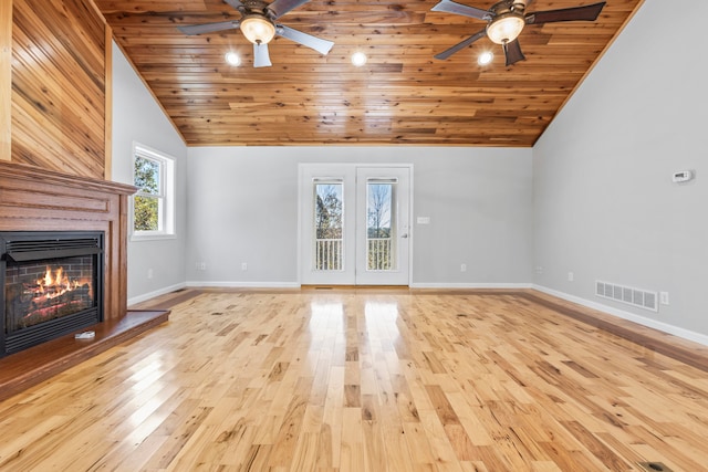 unfurnished living room featuring wooden ceiling, ceiling fan, light hardwood / wood-style flooring, and high vaulted ceiling