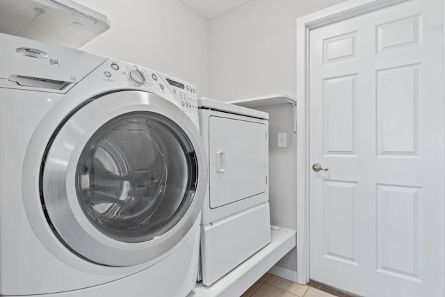 laundry area featuring washing machine and dryer