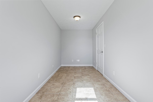 empty room with light tile patterned floors