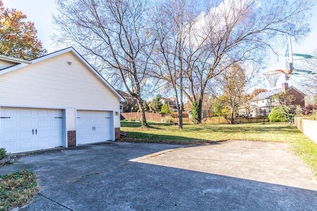 garage with a lawn