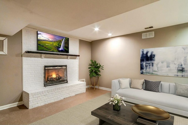 living room featuring a fireplace