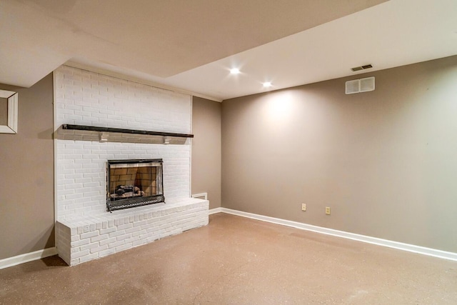 unfurnished living room with a brick fireplace