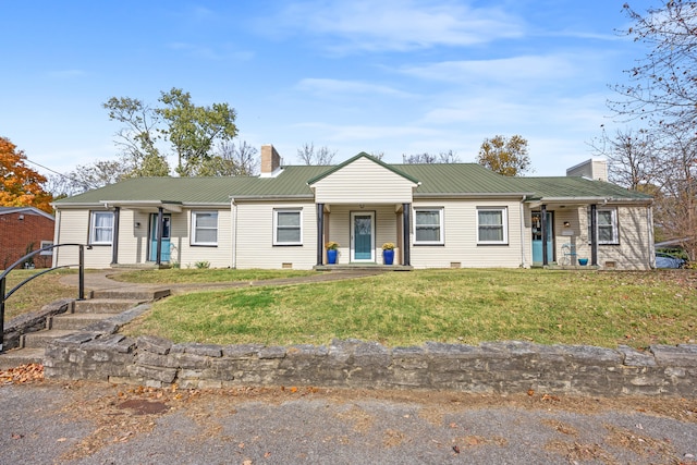 ranch-style house featuring a front yard