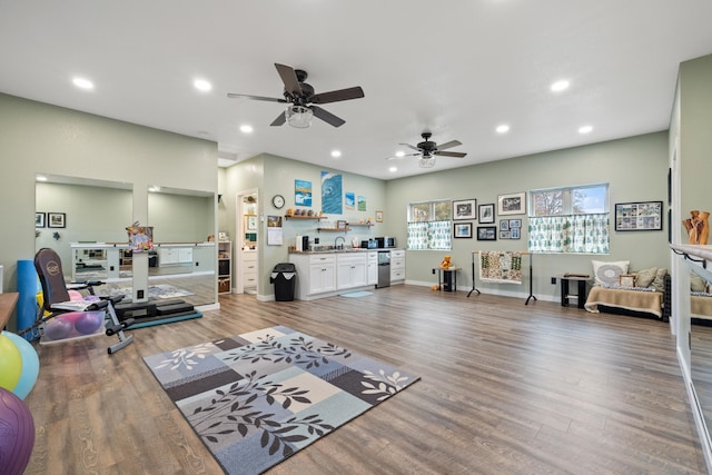 2446 Poplar Springs Rd Unit 2, Liberty, KY 42539 - living room featuring recessed lighting, light wood-style floors, a ceiling fan, and baseboards