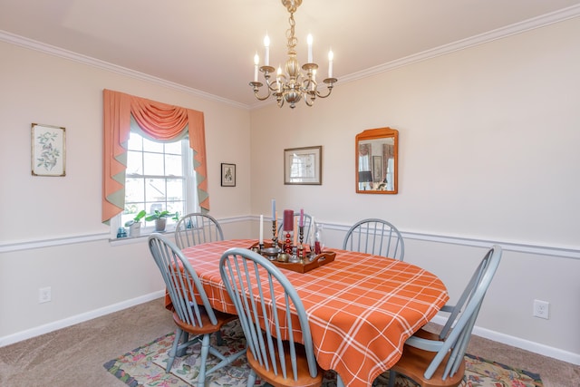 carpeted dining area featuring an inviting chandelier and ornamental molding