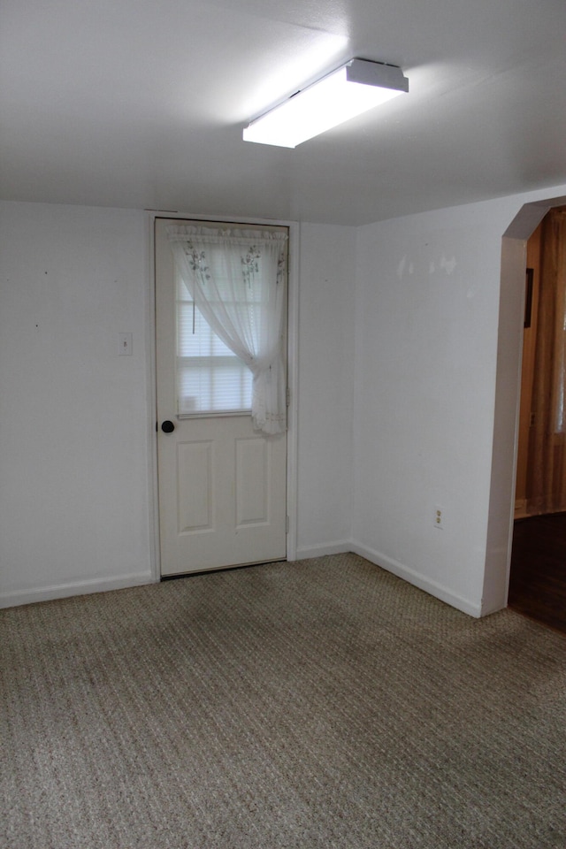 spare room with carpet floors