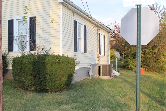 view of home's exterior featuring a yard