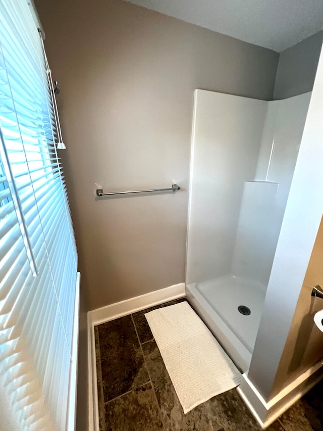 bathroom with walk in shower