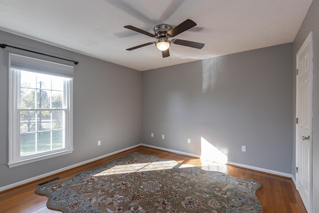 spare room featuring ceiling fan and wood-type flooring