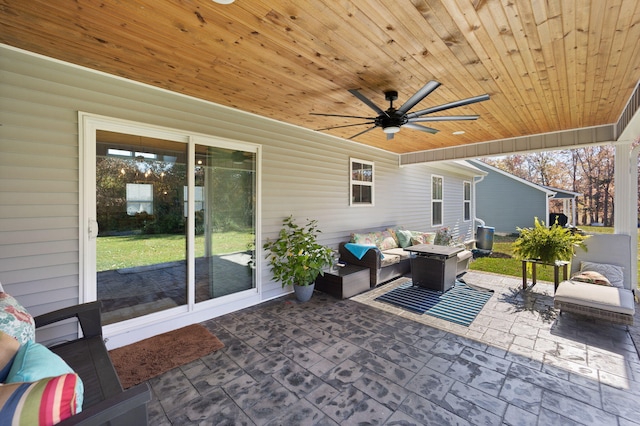 view of patio featuring an outdoor living space and ceiling fan