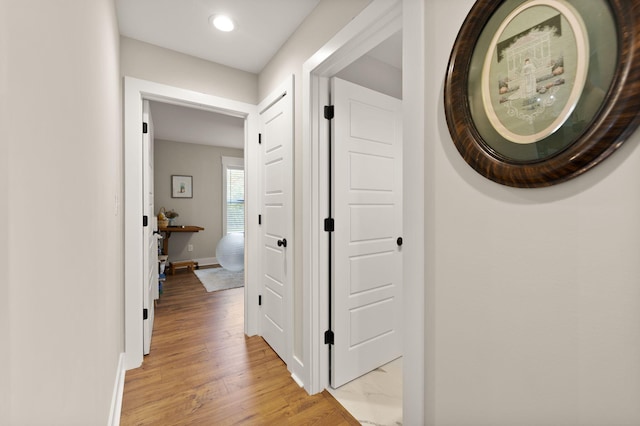 hall featuring light hardwood / wood-style flooring