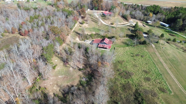 birds eye view of property with a rural view