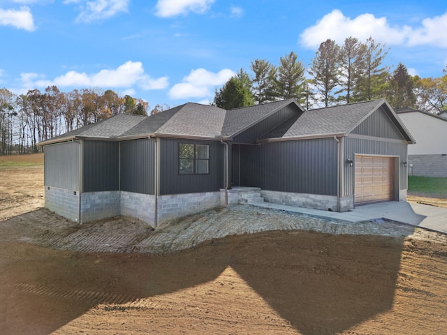 view of front of home with a garage