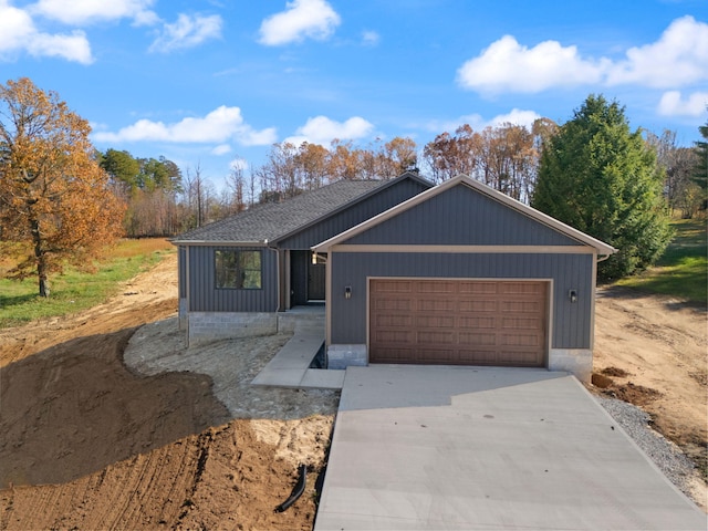 view of front of home with a garage