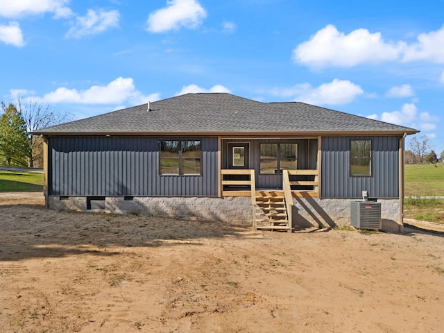 back of property with central air condition unit