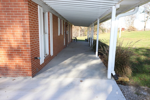 view of patio featuring a carport