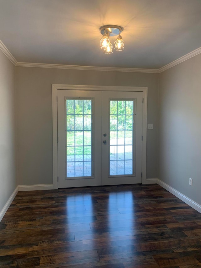 entryway with dark hardwood / wood-style flooring, french doors, and crown molding