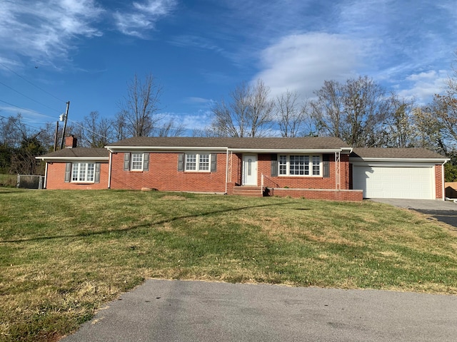 single story home with a garage and a front yard