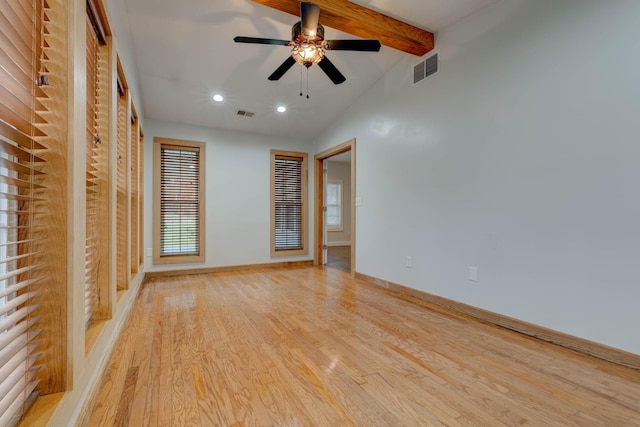 interior space featuring vaulted ceiling with beams, ceiling fan, light wood-type flooring, and a closet