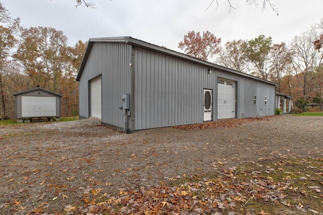 view of outbuilding with a garage