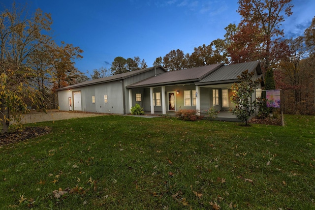 275 Johnson Rd, Morehead, KY 40351 - rear view of house with a yard, metal roof, and a porch