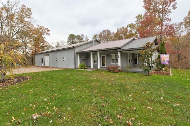 single story home with a porch and a front yard