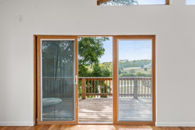 583 College Rd, Paris, KY 40361 - doorway featuring wood finished floors and baseboards