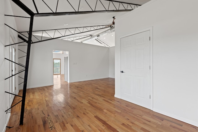 unfurnished room featuring hardwood / wood-style flooring