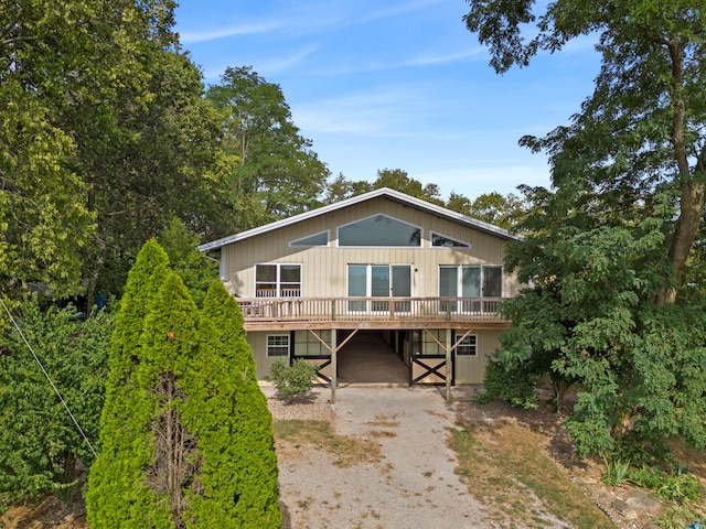 view of front of property featuring a wooden deck