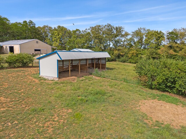583 College Rd, Paris, KY 40361 - view of grassy yard with a pole building and an outdoor structure
