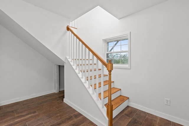 stairway with wood-type flooring