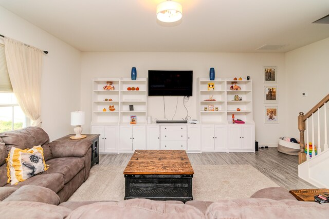 living room featuring light wood-type flooring