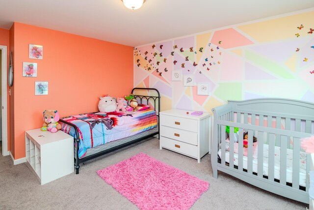 bedroom with light colored carpet