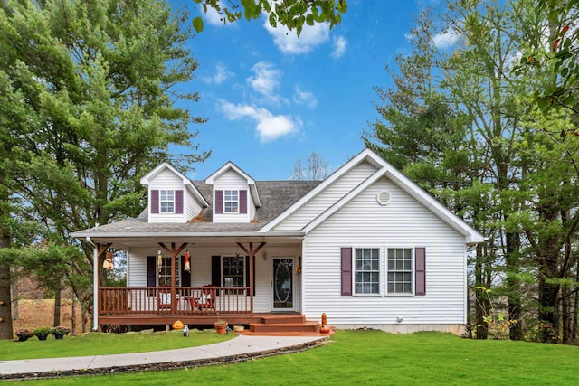 view of front facade with a front lawn and a porch