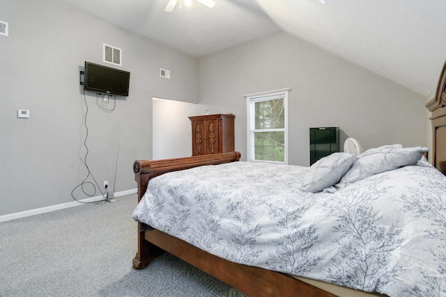 bedroom with lofted ceiling, ceiling fan, and carpet floors