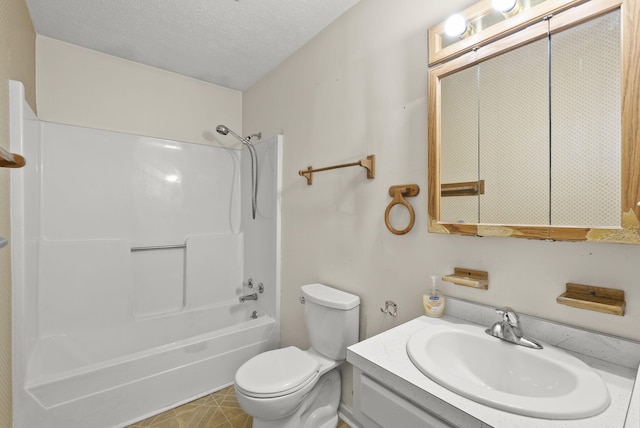 full bathroom with bathing tub / shower combination, vanity, a textured ceiling, and toilet